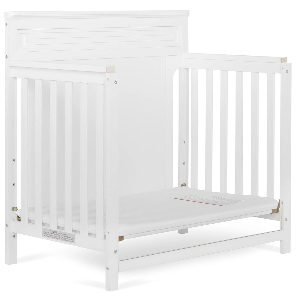 White 4-in-1 Convertible Mini Crib K43760