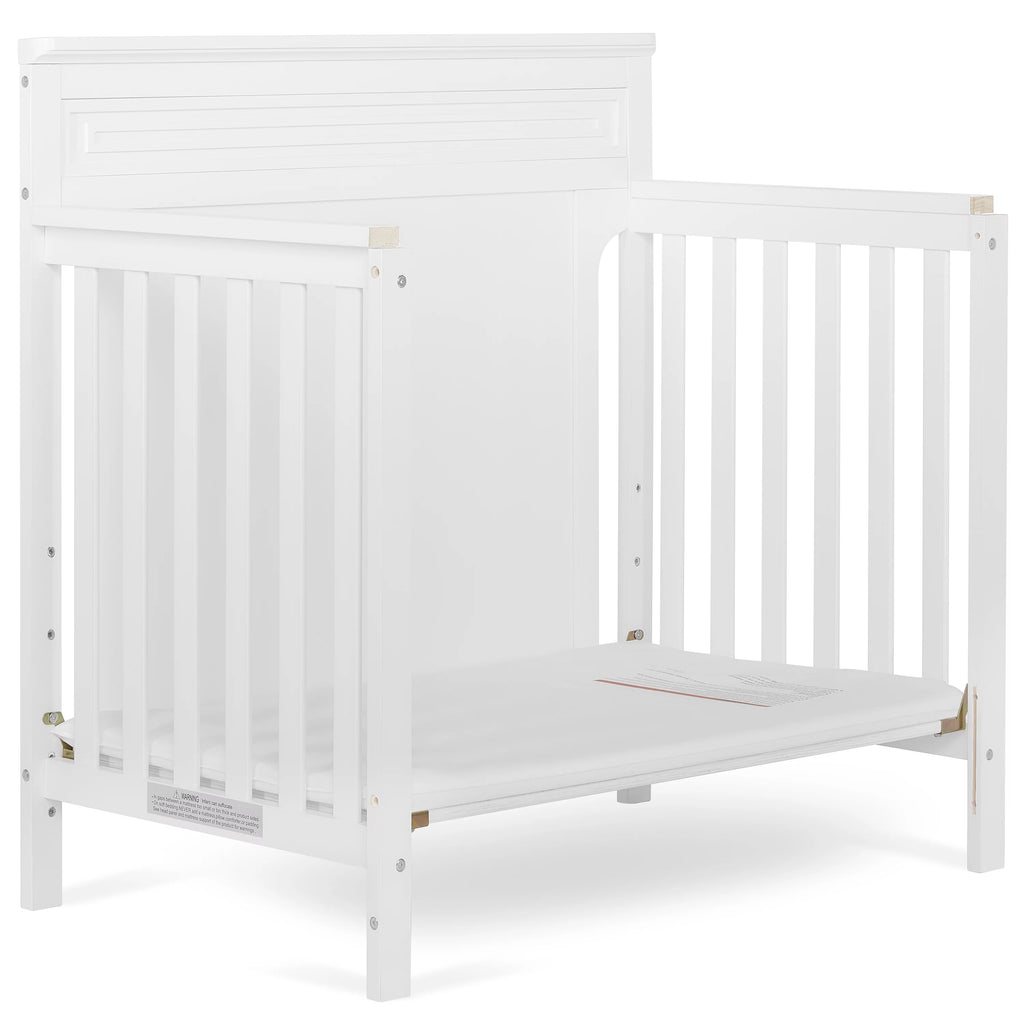 White 4-in-1 Convertible Mini Crib K43760